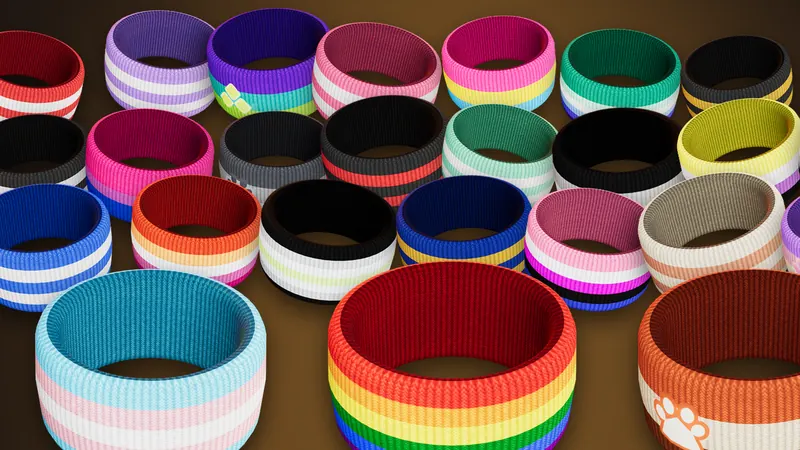 A pile of knit bands in pride flag colours, animal emblems and classic stripes.