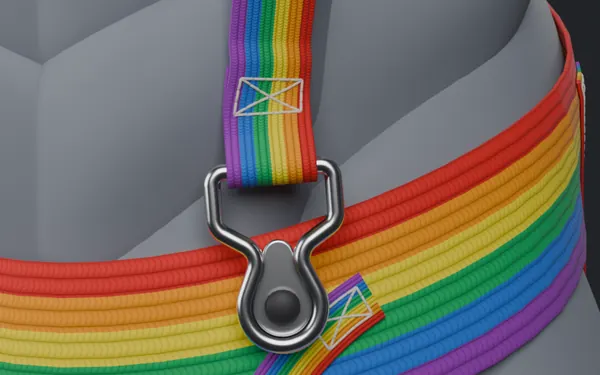 Close-up of a silver clip and D-ring joining a stitched rainbow strap to a rainbow belt, made with Strap Builder.